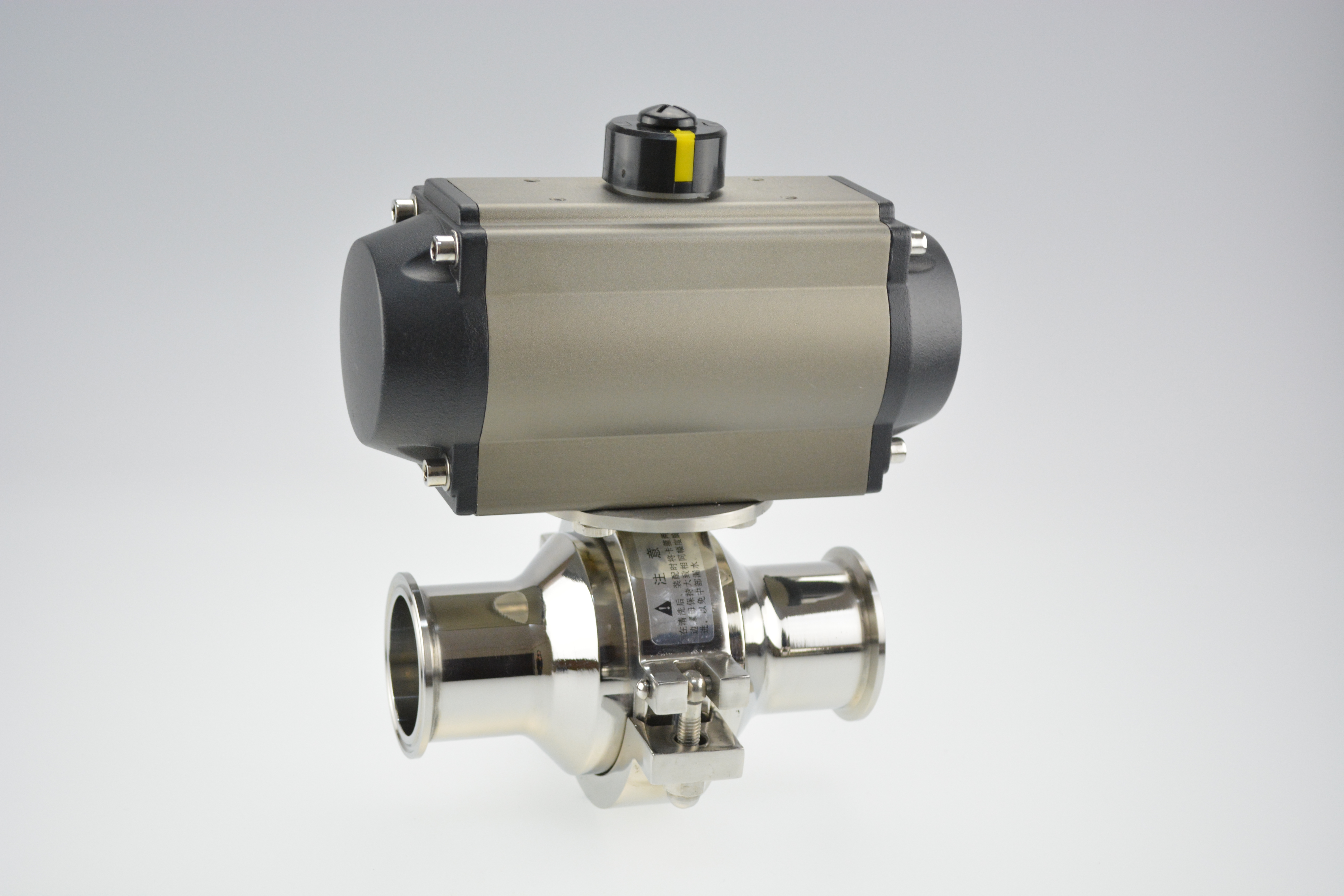 Stainless steel actuator intermediate clamp non-retention ball valve